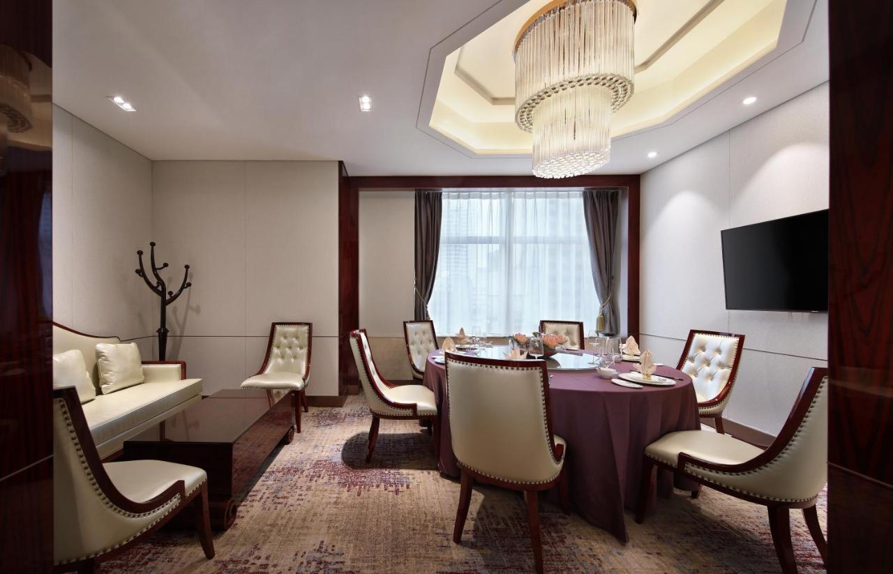 Asia International Hotel Guangdong Canton Esterno foto A meeting room at the hotel