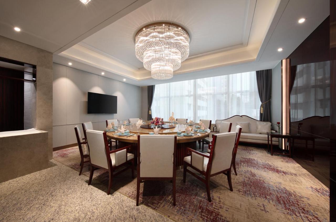 Asia International Hotel Guangdong Canton Esterno foto A private dining room at the hotel