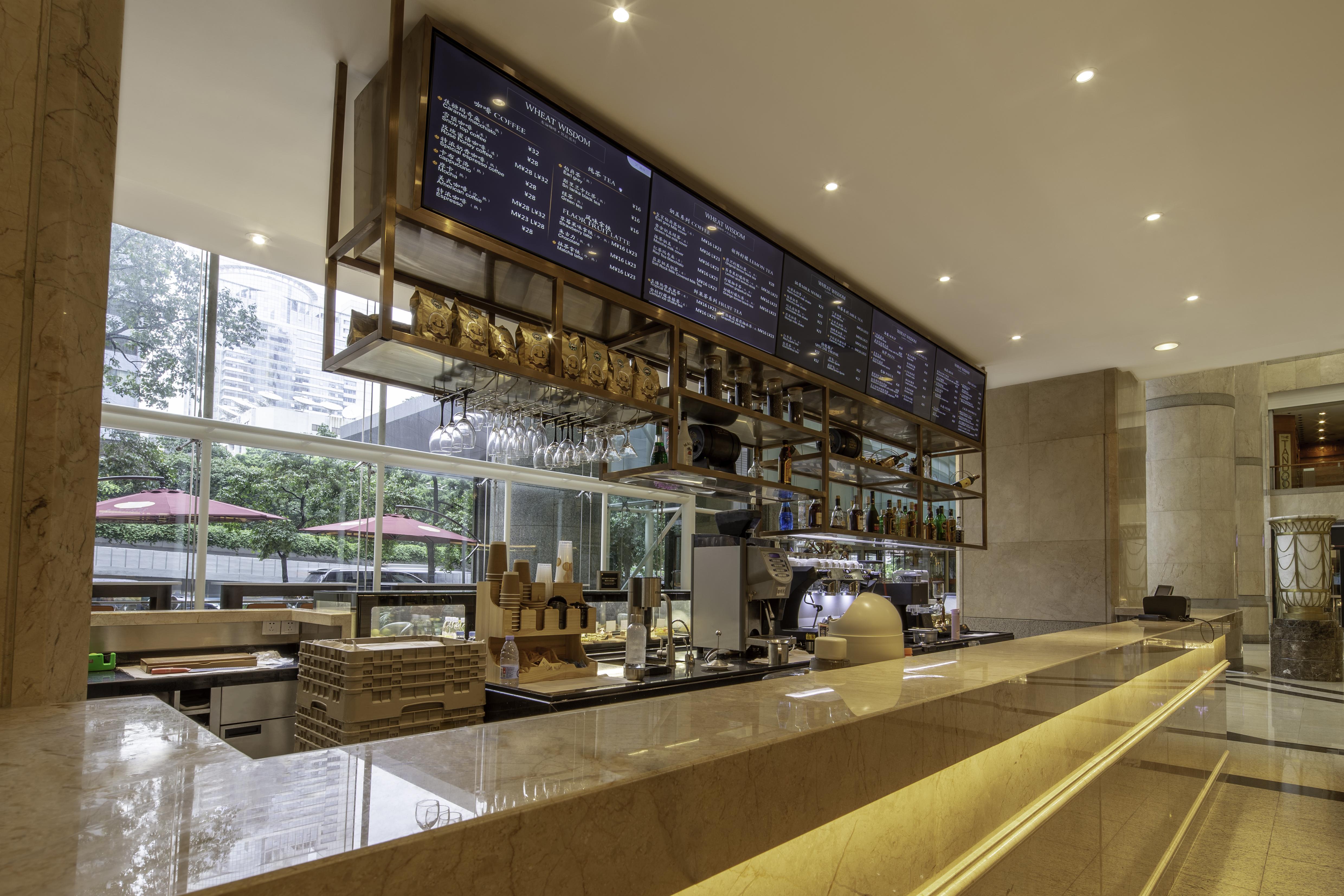 Asia International Hotel Guangdong Canton Esterno foto The bar at the lobby